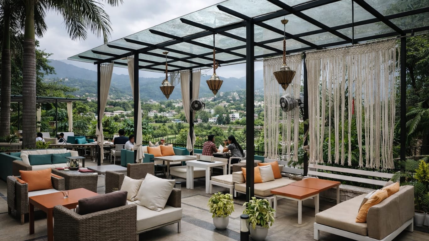 Outdoor seating area in Dehradun café surrounded by greenery