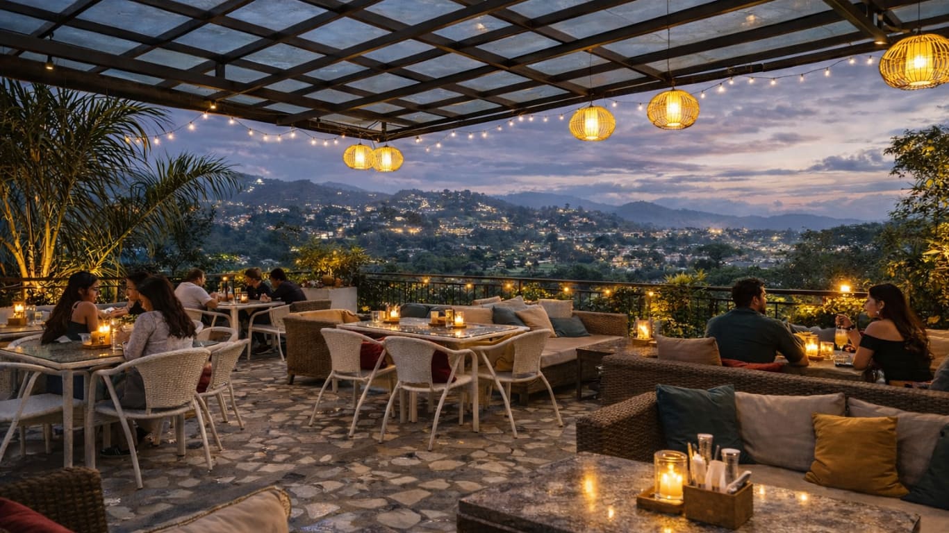 Rooftop bar serving signature cocktails at sunset